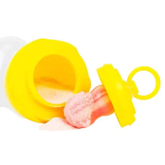 Closeup of the lollipop pacifier with bottom of the egg open with flavored candy powder inside on its side.